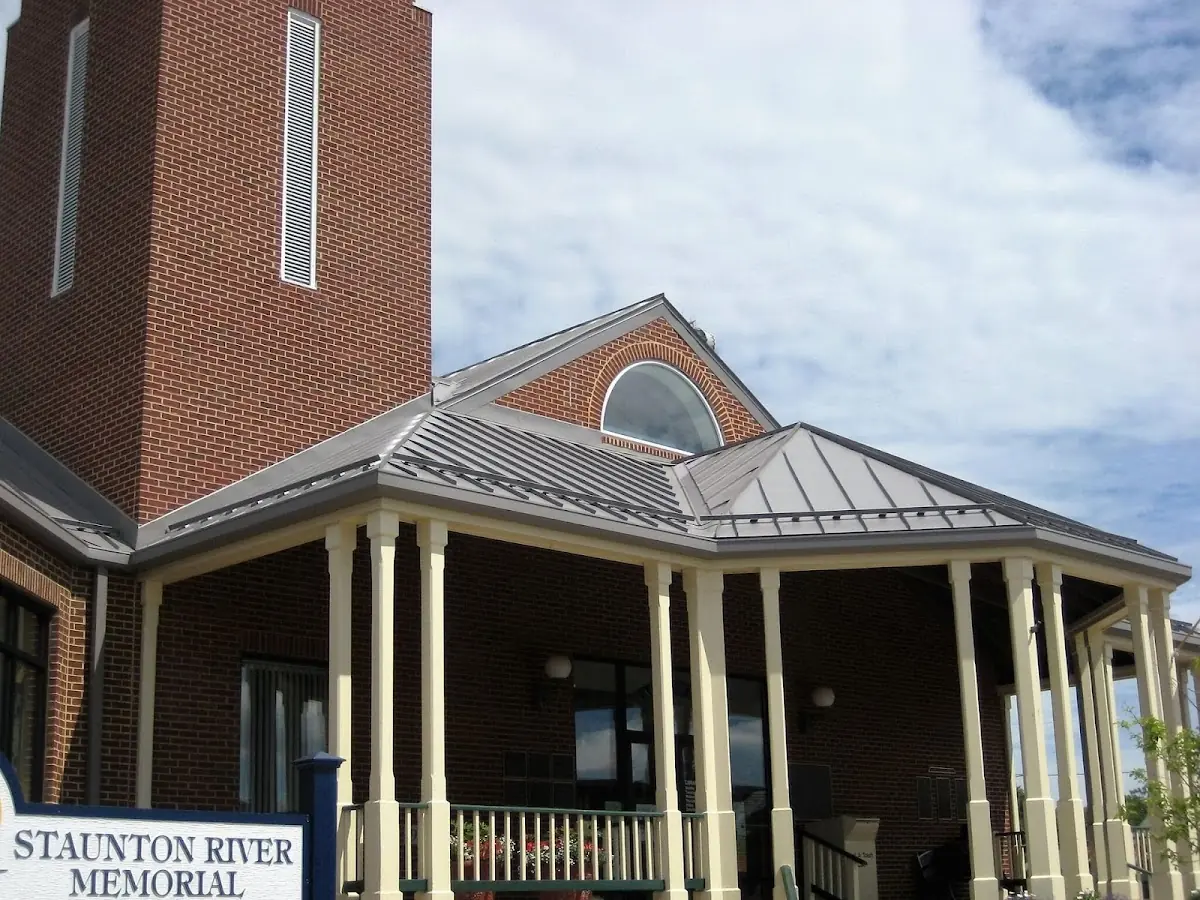 Skilled roofing craftsmen working on a residential roof in Frankfort